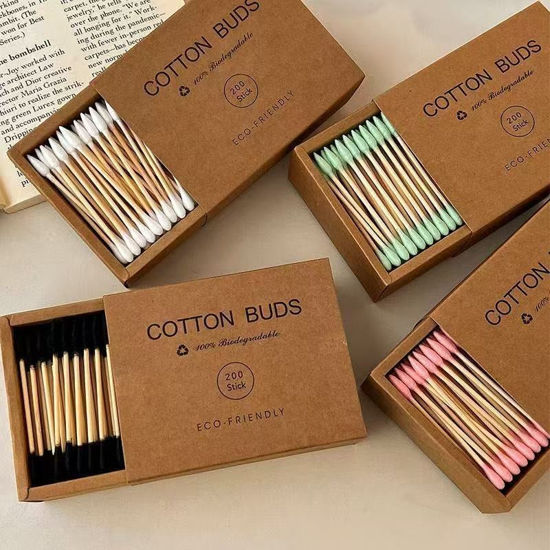 Eco-friendly bamboo and wood ~ 200-pack of disposable double-ended cotton swabs in a kraft paper box for cleansing and makeup removal.