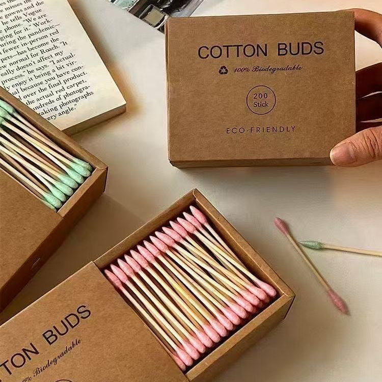 Eco-friendly bamboo and wood ~ 200-pack of disposable double-ended cotton swabs in a kraft paper box for cleansing and makeup removal.