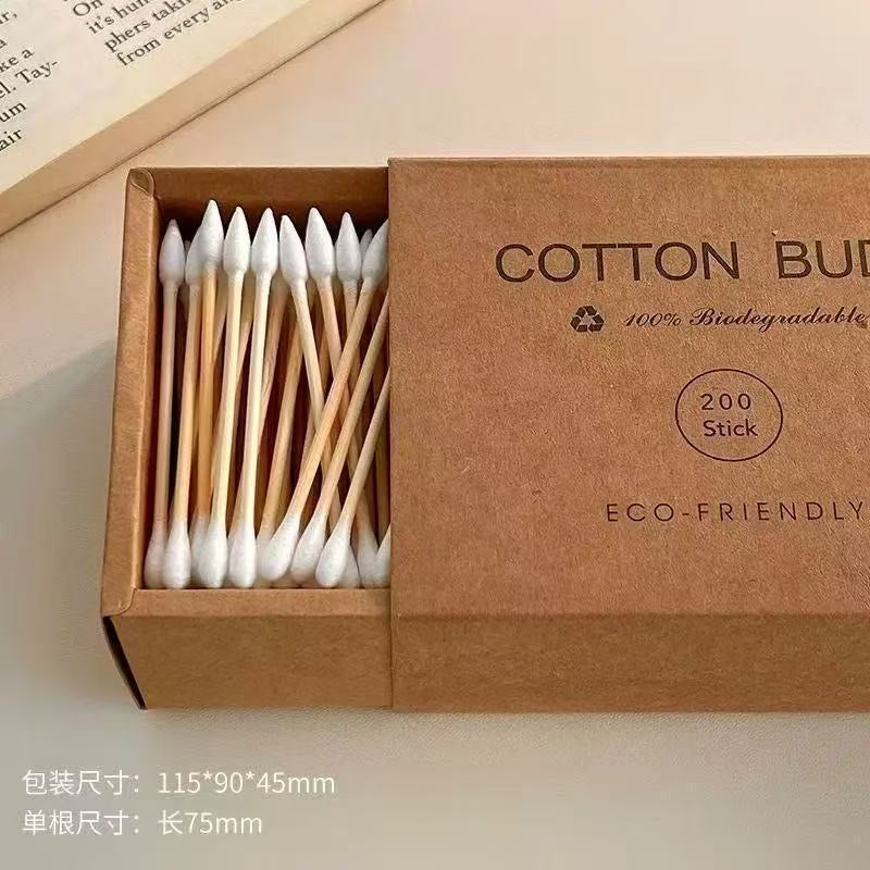 Eco-friendly bamboo and wood ~ 200-pack of disposable double-ended cotton swabs in a kraft paper box for cleansing and makeup removal.