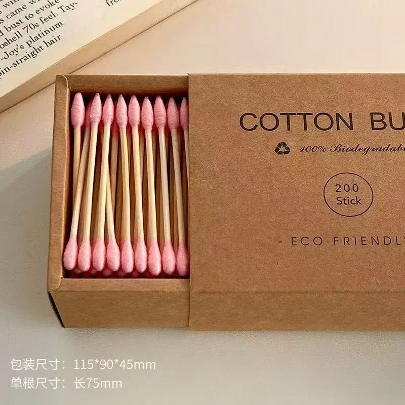 Eco-friendly bamboo and wood ~ 200-pack of disposable double-ended cotton swabs in a kraft paper box for cleansing and makeup removal.