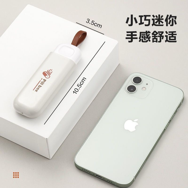 Small portable pillbox, mini pill holder, small box for carrying morning, noon, and evening pills.