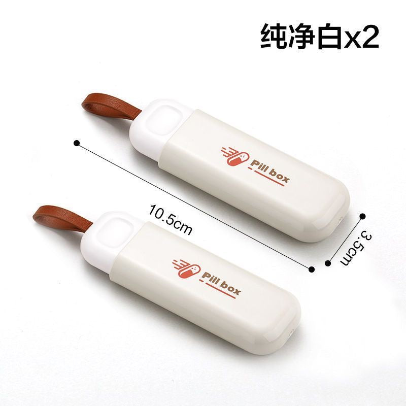Small portable pillbox, mini pill holder, small box for carrying morning, noon, and evening pills.